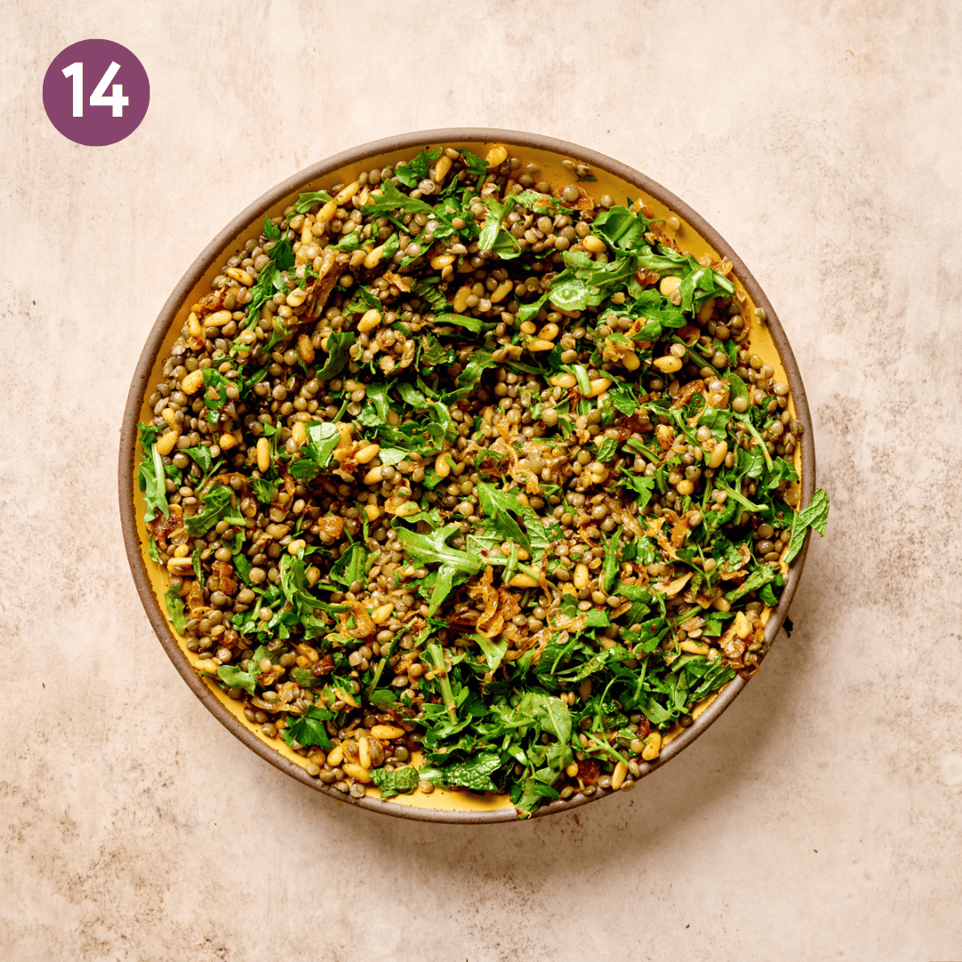 Arugula and herbs mixed into lentil salad.